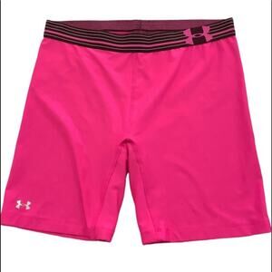 Under Armour heat gear hot pink shorts.15.25" length.  Waist size is 29".